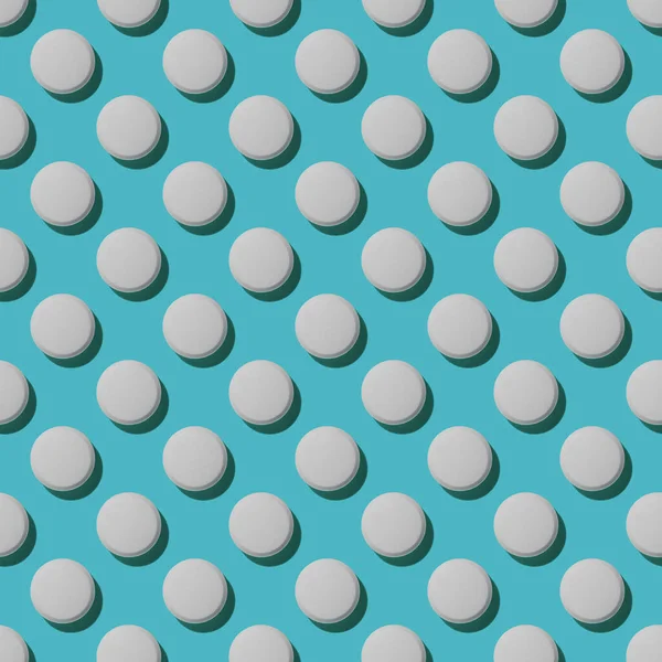 Açık mavi arka planda tıbbi haplar ve tabletlerle moda, kopyalama alanı. Yaratıcı tıp konsepti. Asgari düzeyde. Üst manzara, düz uzanma