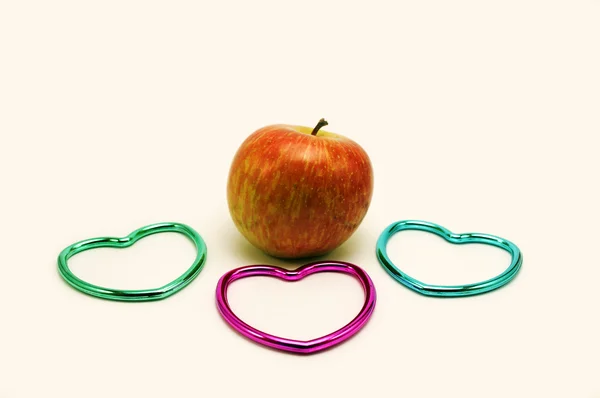 Apple with hearts — Stock Photo, Image