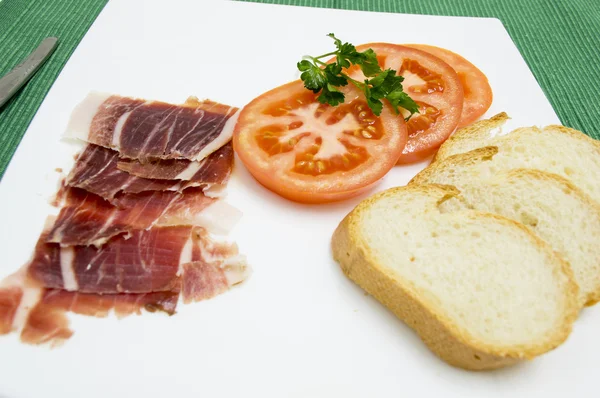 Tomato, ham and bread — Stock Photo, Image