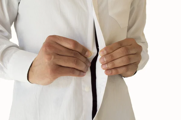 Vista detallada del hombre de negocios ajustando sus botones de camisa — Foto de Stock