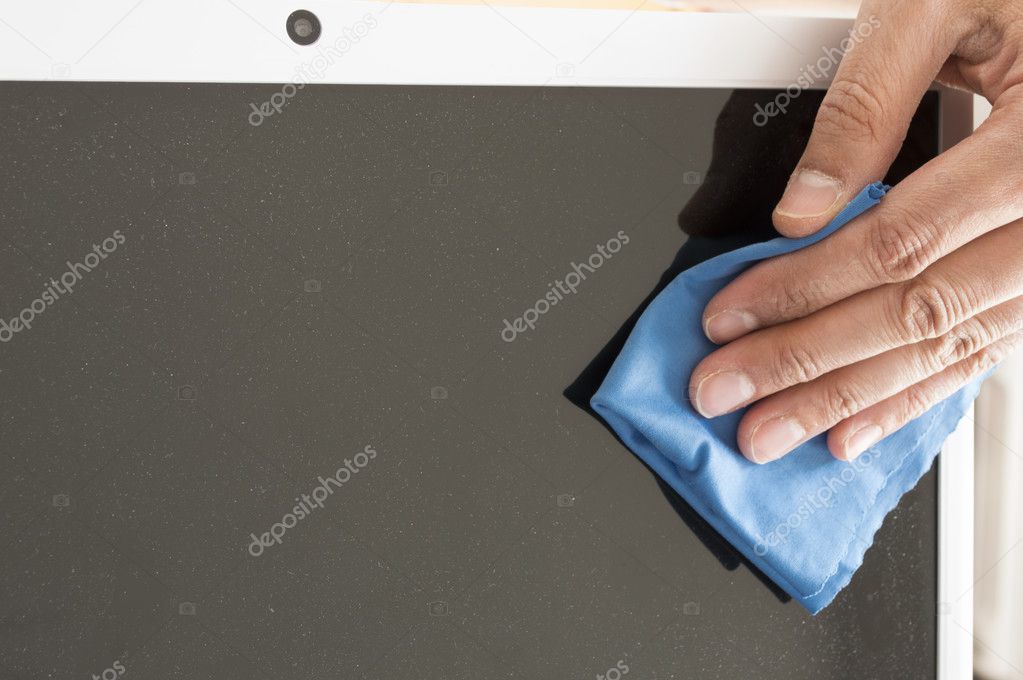 Cleaning a Flat screen with an antistatic cloth blue