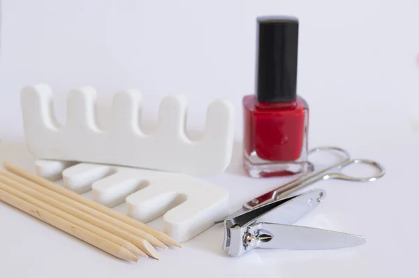 Nail polish nail clipper toe dividers and Cuticle pushers — Stock Photo, Image