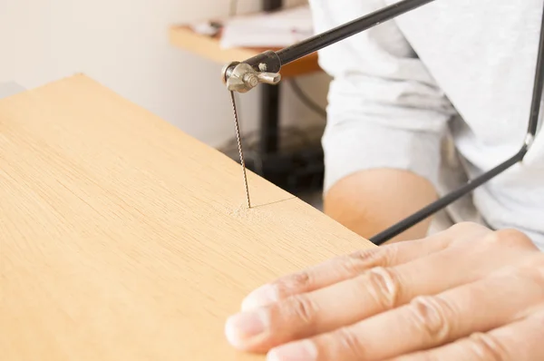 Marquetry craftsman this sawing board — Stock Photo, Image