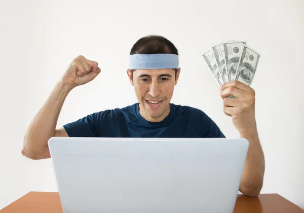 Betting Online winning a lot of dollars — Stock Photo, Image