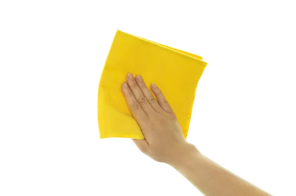 Mão segurando uma limpeza amarela — Fotografia de Stock
