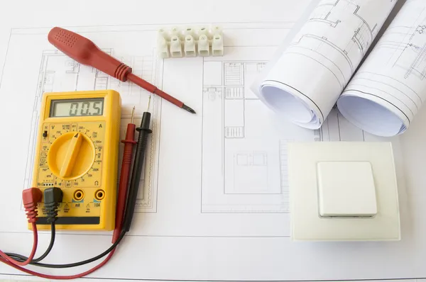 Plans and electrical tools — Stock Photo, Image