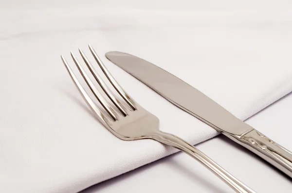 Table with a knife and fork — Stock Photo, Image