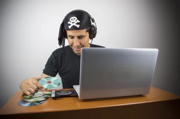 Informatic hacker stealing music — Stock Photo, Image