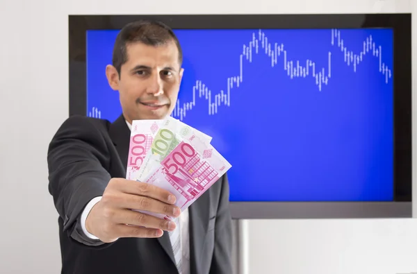 Businessman offering euro — Stock Photo, Image