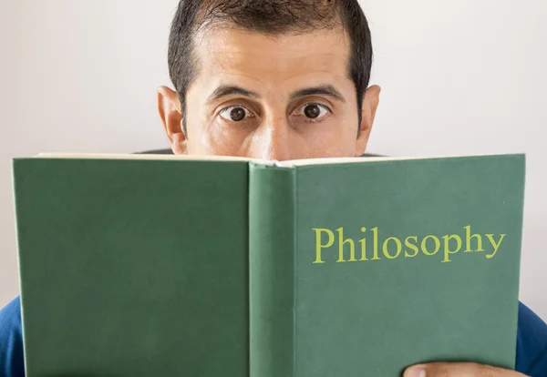 Man reading philosophy — Stock Photo, Image