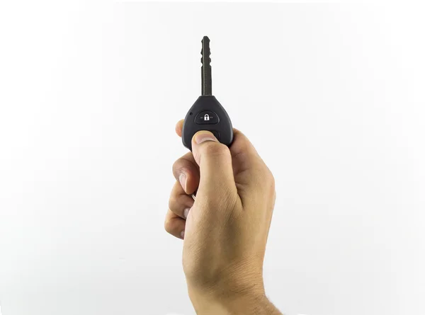 Man holding a car key — Stock Photo, Image