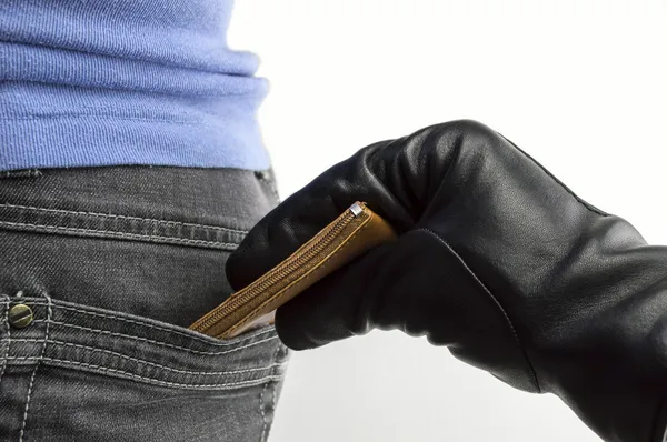 Money thief stealing a woman — Stock Photo, Image