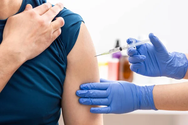 Shot Nurse Applying Bandaid His Patien Arm Covid — Stock Photo, Image