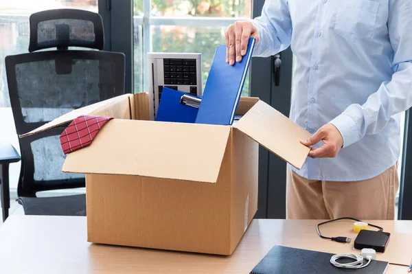 Cropped Shot Businessman Leaving Work Putting His Belongings Box His — Stock Photo, Image