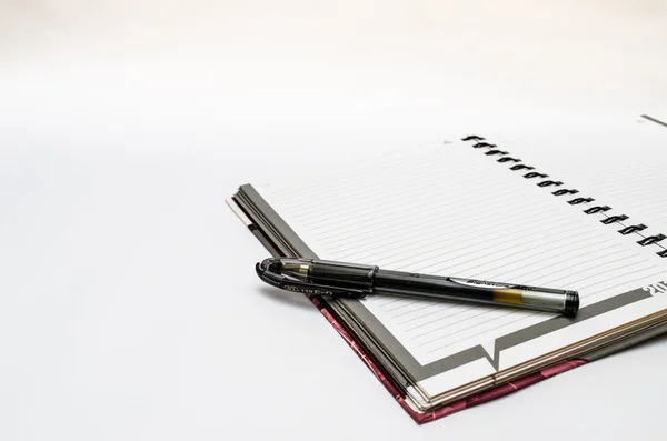 Writing Pen on a book — Stock Photo, Image