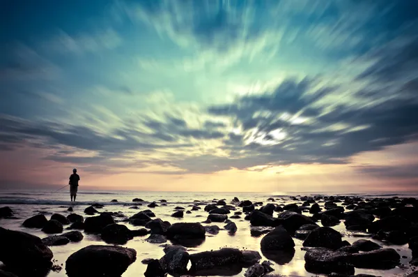 Zonsondergang aan het strand — Stockfoto