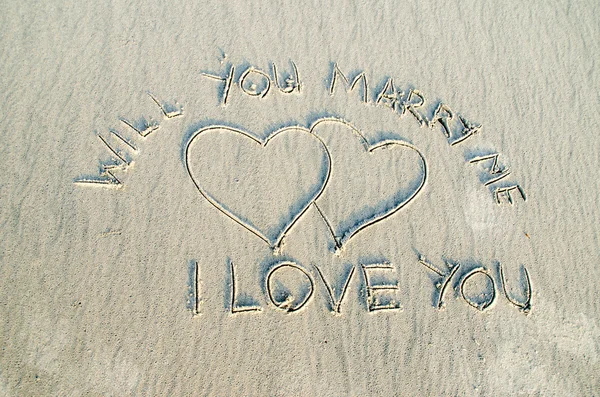 Love and text on sand — Stockfoto