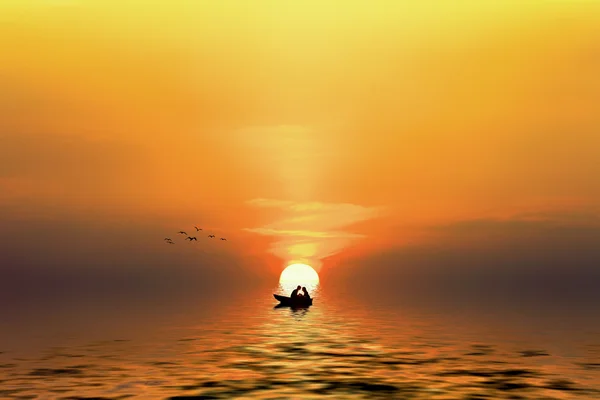 Силует пари в човні, коли сонце спускається — стокове фото