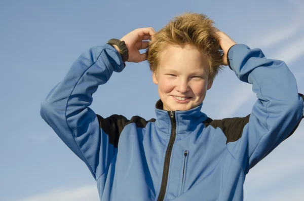 Kid adjusts his hair — Stock Photo, Image