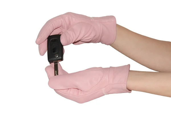 Autoschlüssel in eleganten rosa Handschuhen — Stockfoto
