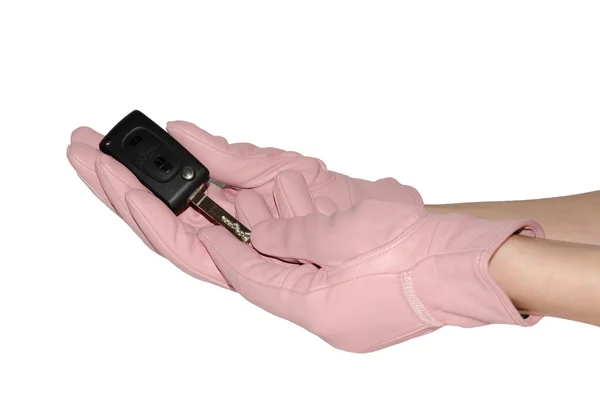 Frauenhände in ledernen rosa Handschuhen mit Autoschlüssel — Stockfoto