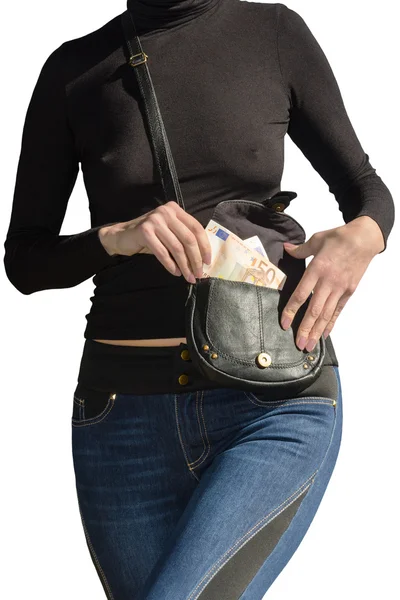 Beautiful woman pulls out bundle of euro banknotes from handbag isolated — Stock Photo, Image