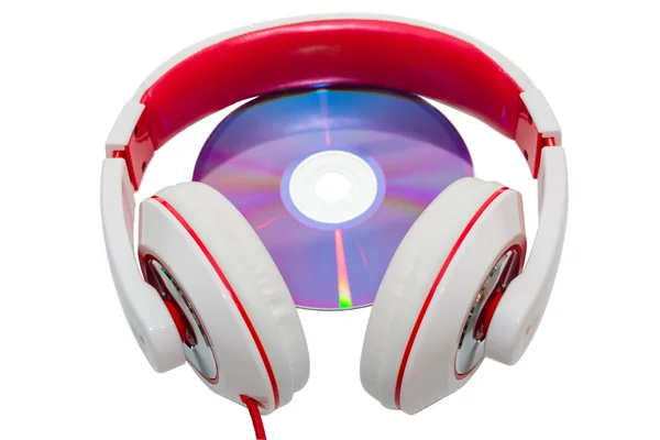 Colorful casual wired headphones and multimedia disc — Stock Photo, Image