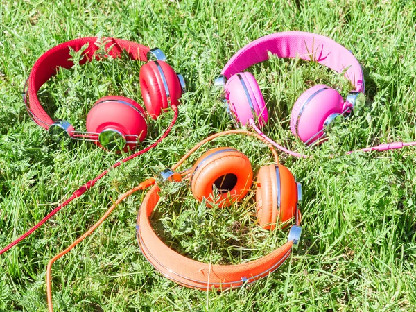 Készlet-ból három varicolored színes fejhallgató — Stock Fotó