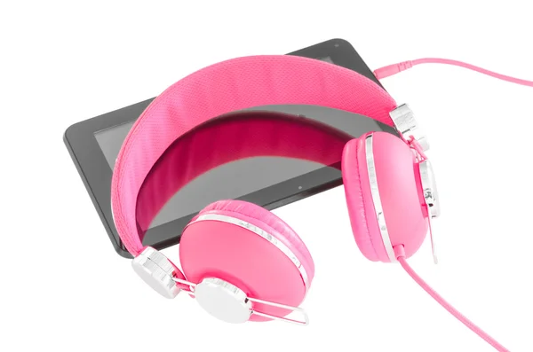 Vibrant pink female headphones and black tablet pc — Stock Photo, Image