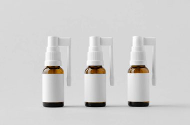 Ağız spreyi, boğaz spreyi. Üzerinde boş etiket olan kehribar şişe.