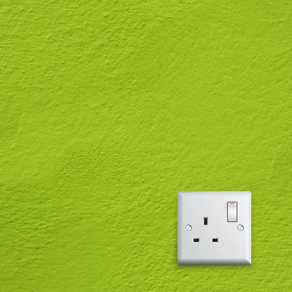 Green Energy in the Great Britain electrical socket — Stock Photo, Image