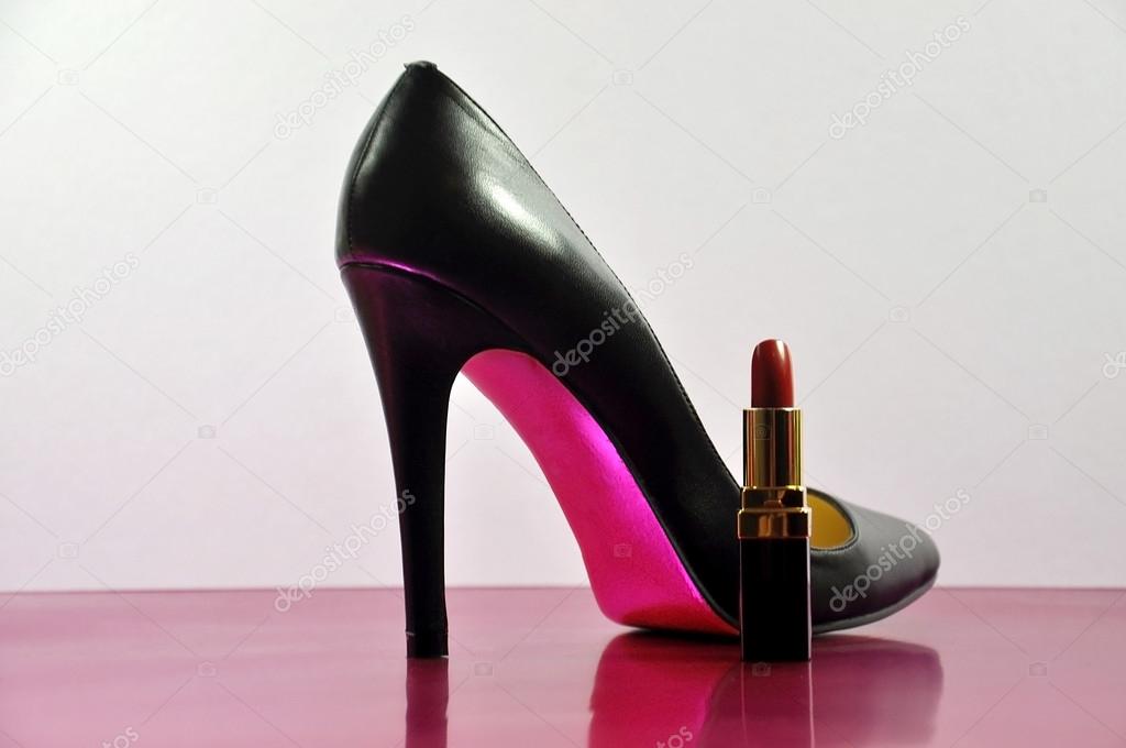 Black High Heel Stilettos and Red Lipstick on Pin Background