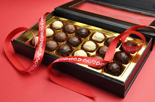 Valentine romantic opened box of chocolates. — Stock Photo, Image