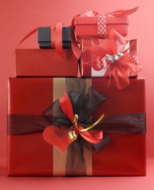 Stack of beautiful red present gifts for Valentine, Christmas, or birthday.