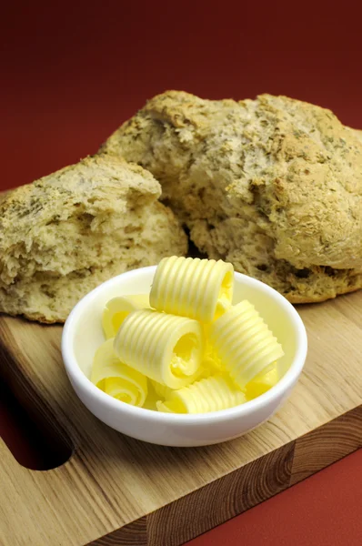 Australian traditional beer damper bread with butter curl — Stock Photo, Image