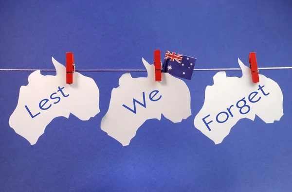 Remembrance, November 11, or Anzac Day, April 25, public holiday with a bright and vivid pegs on a line message greeting — Stock Photo, Image