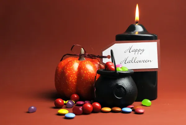 Halloween trick or treat candy in cauldrons — Stock Photo, Image