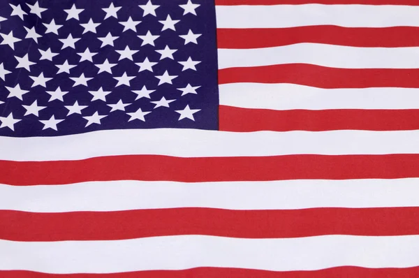 USA hvězdy a pruhy vlajku blízko na pozadí, cestování nebo dovolené & události — Stock fotografie