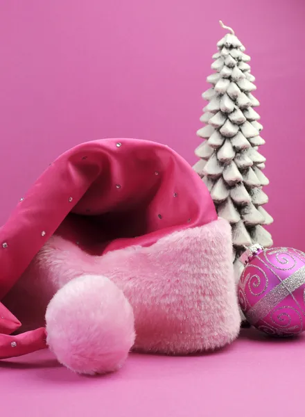Pink Santa Hat with festive fuchsia pink Christmas decorations, gift and ornaments — Stock Photo, Image