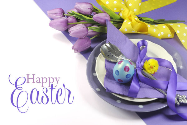 Happy Easter yellow and purple lauve lilac theme easter table place setting
