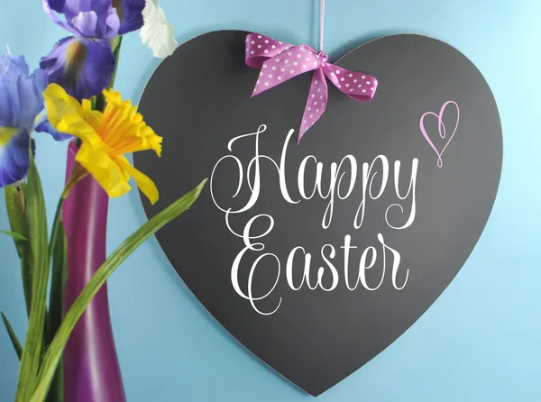 Happy Easter greeting on heart shape blackboard — Stock Photo, Image