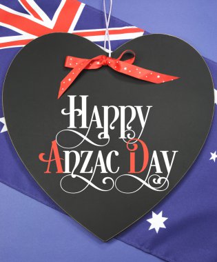 Happy Anzac Day, April 25, national public holiday celebration for returned soldiers, greeting on heart shaped blackboard clipart