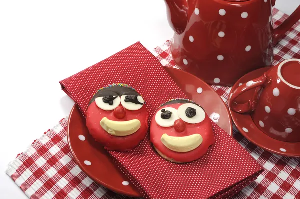 Handmade by children happy face candy cookie with red polka dot tea or coffee — Stock Photo, Image