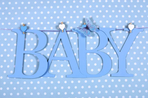 Bebê menino berçário azul BABY letras bunting pendurado de cavilhas em uma linha — Fotografia de Stock