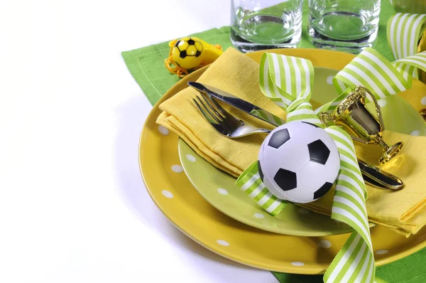 Soccer football party table in yellow and green team colors — Stock Photo, Image