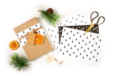 Scandi Christmas composition flatlay with gifts and decorations. Modern trend gift wrapping.