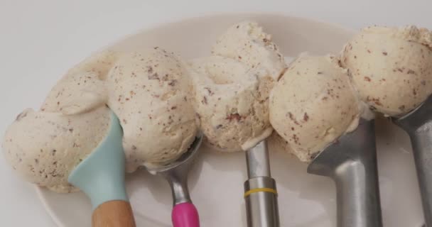 Ice Cream Balls Many Different Spoons Vanilla Chocolate Chips Plate — Stock Video