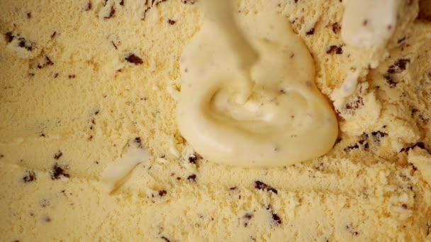 Pour Liquid Ice Cream Top Vanilla Chocolate Chips Flows Slowly — Stock Video