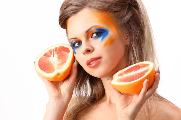 Young woman and grapefruit — Stock Photo, Image