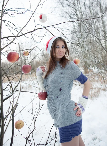 Girl in the woods with an apple. — Stock Photo, Image